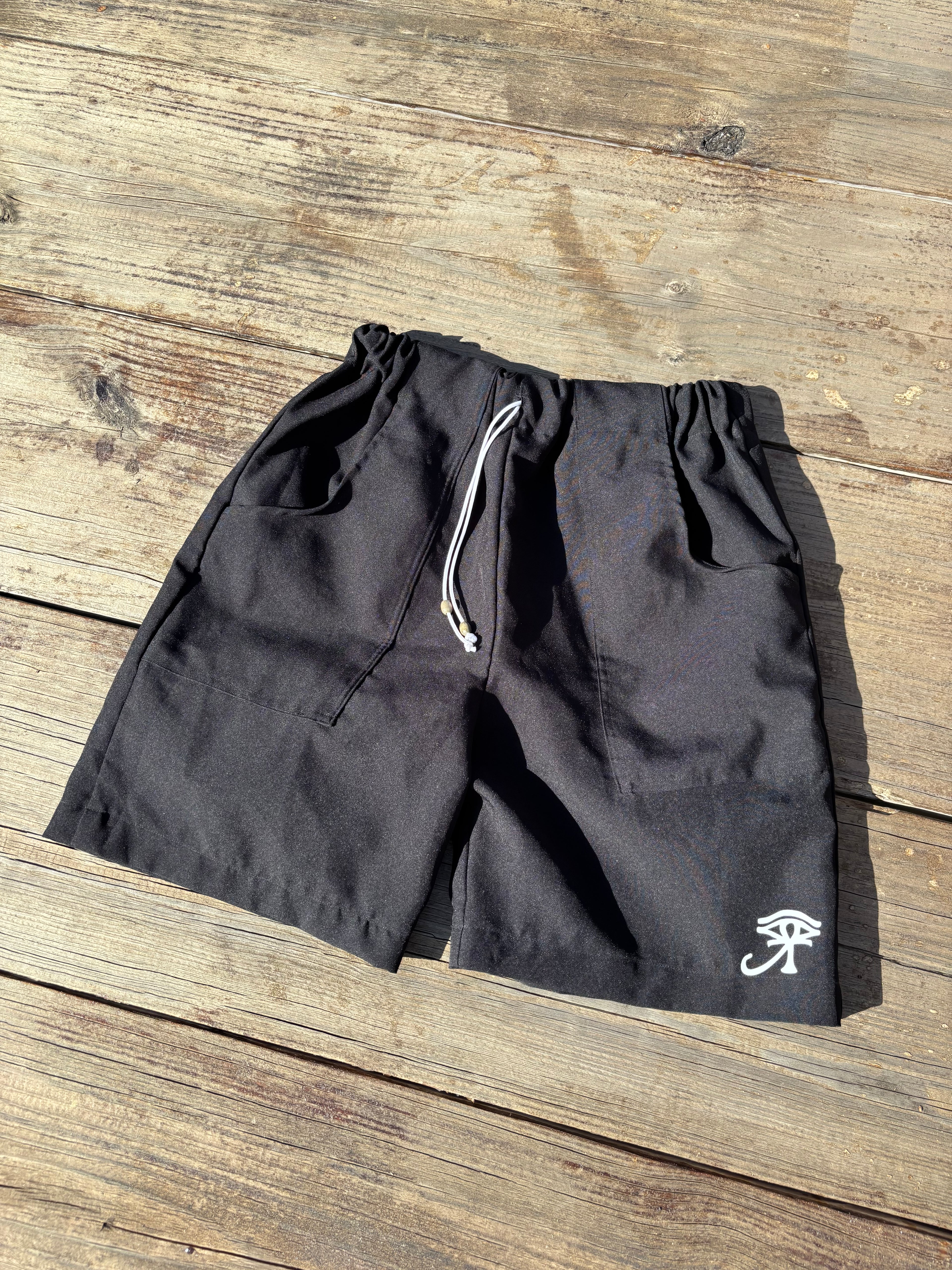 1 OF ⇂ BLACK SHORTS